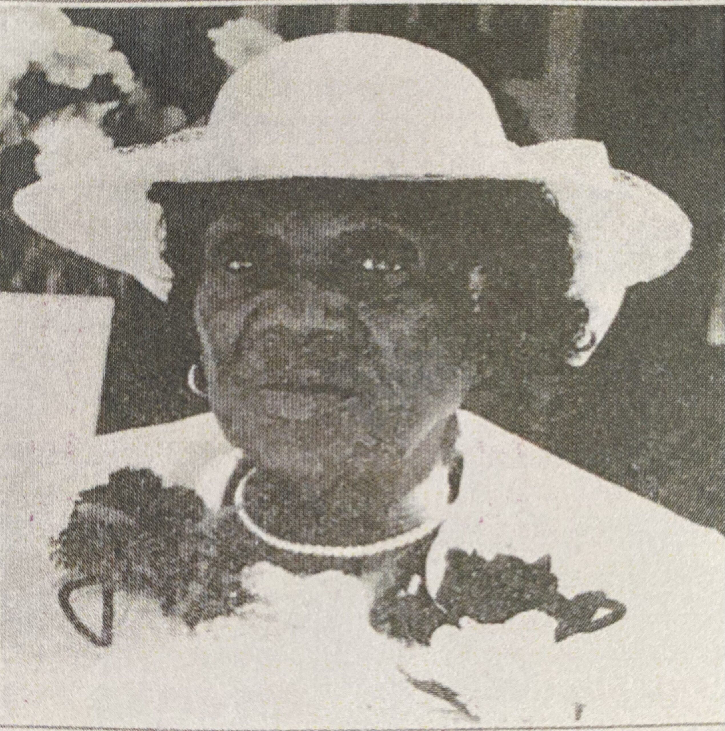 Priscilla Jane Rigby in a white hat, from the family reunion booklet